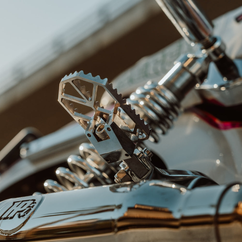 OG Moto X Foot Pegs installed on a Dyna