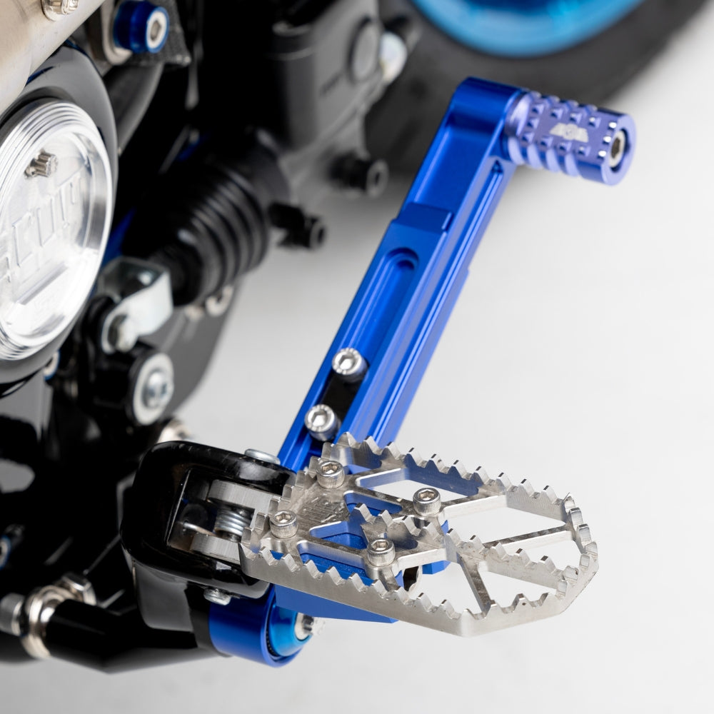 OG Moto X Foot Pegs installed on a Softail Low Rider S FXLRS