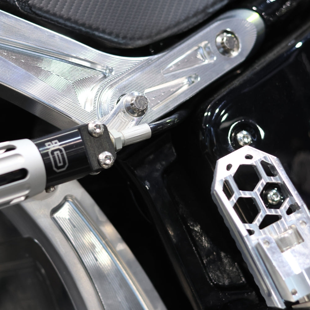 OG Ohlins 2025 Softail Shocks External Preload Master Cylinder Mount installed on a 2025 Softail Low Rider S FXLRST